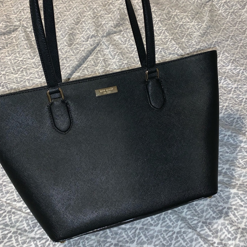 Black Kate Spade purse. Never worn!